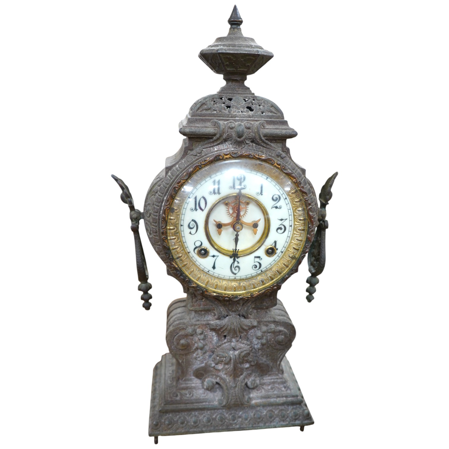 A spelter clock with enamel Arabic dial, 47cm high. Condition - poor to fair, untested